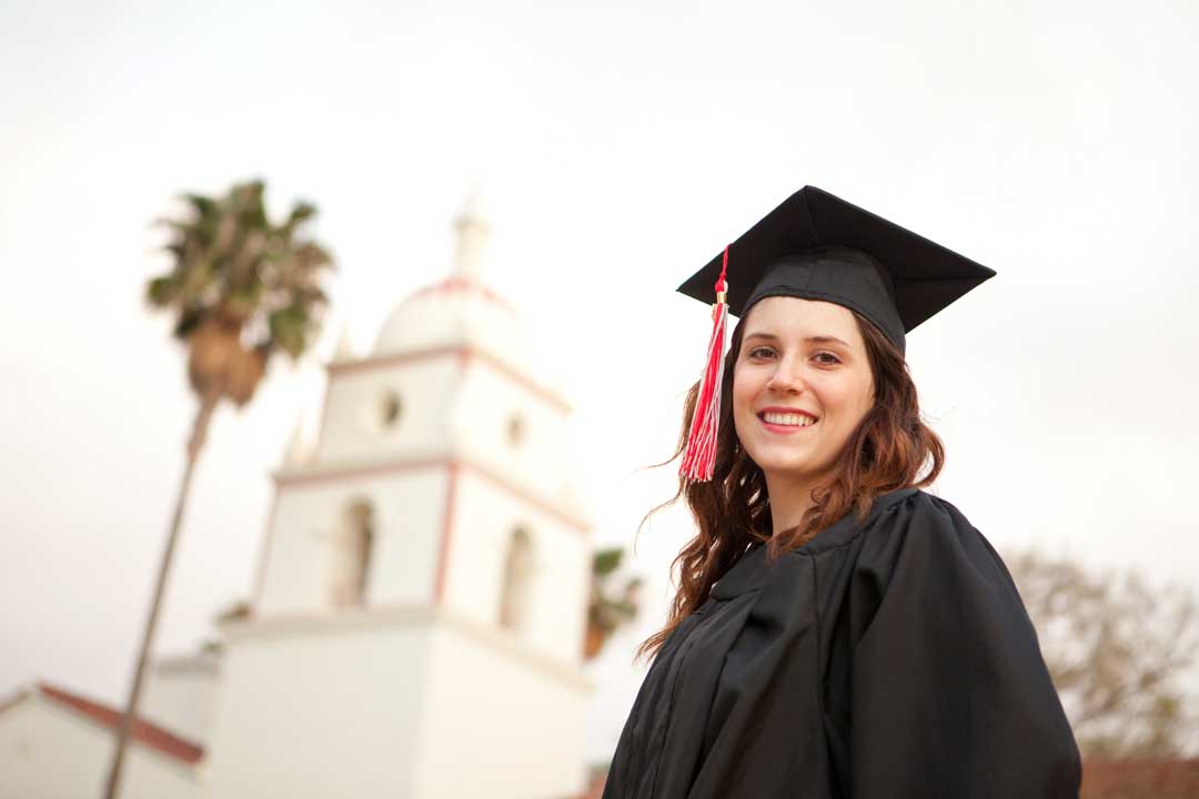 College graduate smiles