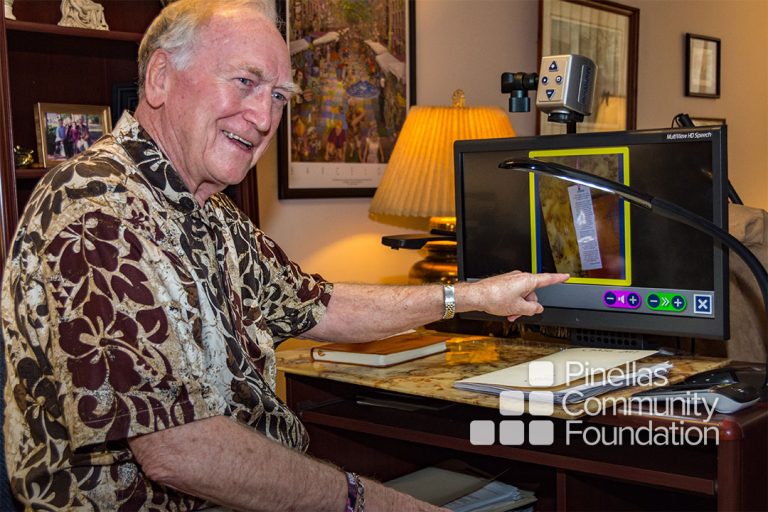 Legally Blind Sherwood White demonstrates computer tools for the visually impaired that he now uses thanks to Lighthouse of Pinellas.