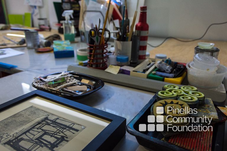 Lynn Foskett Pierson's art studio, close up of table filled with tools.