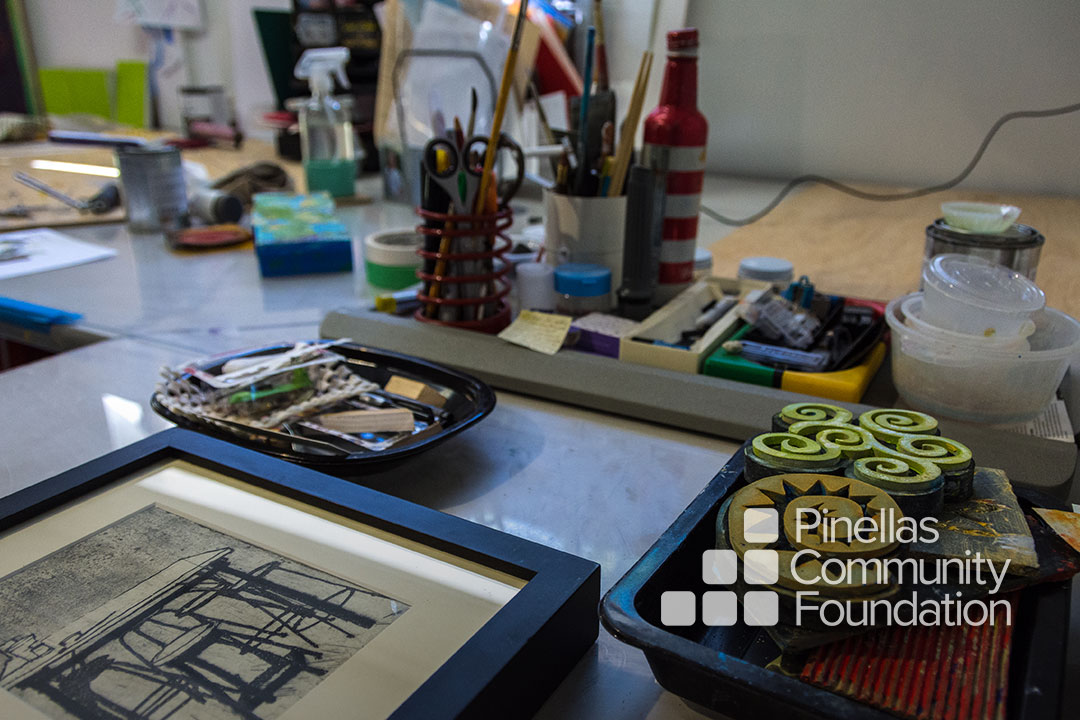Lynn Foskett Pierson's art studio, close up of table filled with tools.