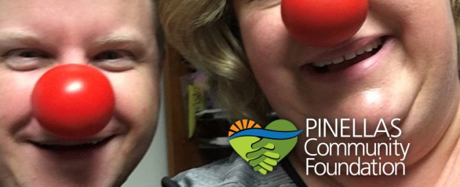 Duggan and Suzanne wearing red clown noses to raise funds.