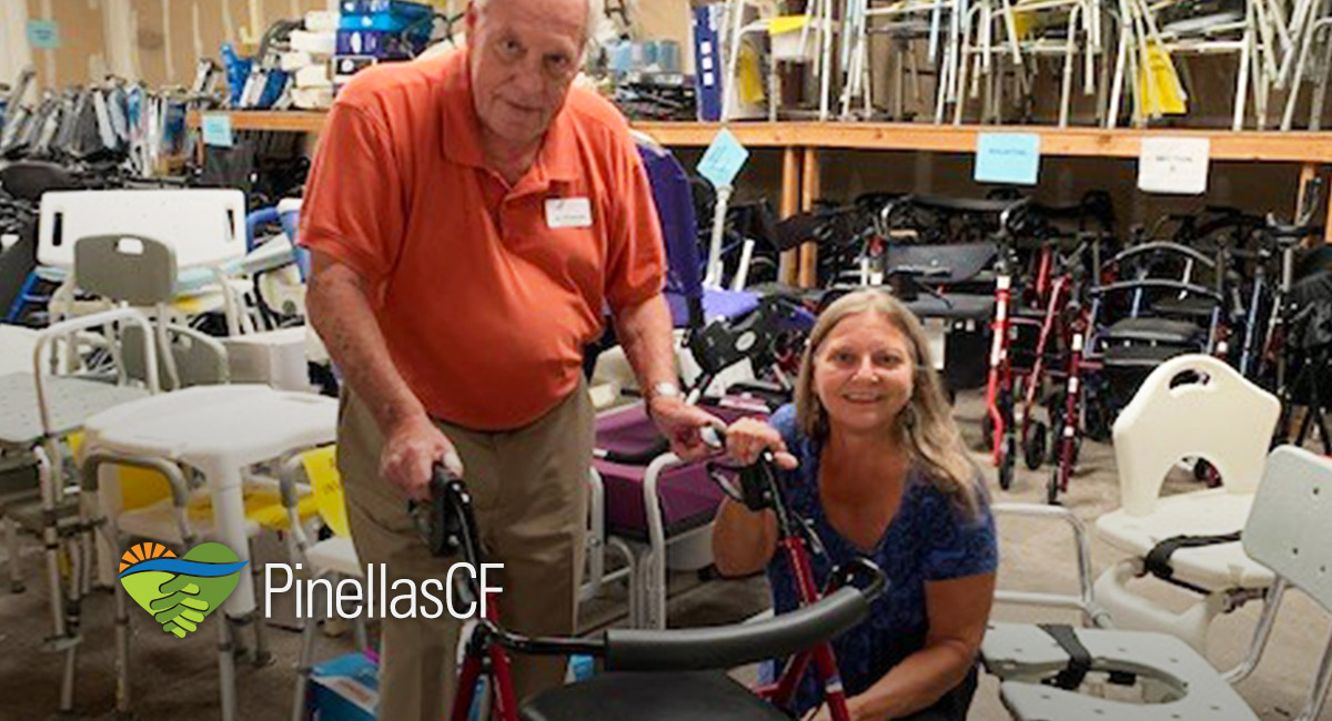 DAC staff members Joseph DiDomenico and Jody Armstrong examine the equipment.