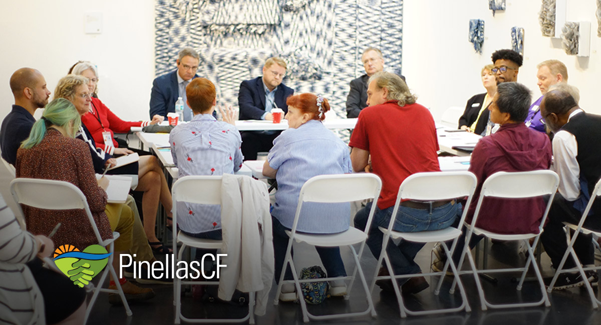 Community members discuss arts and culture at a We Convene meeting.