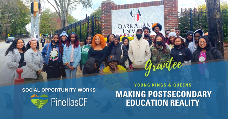 Young Kings & Queens students gather in front of Clark Atlanta University for a campus tour.